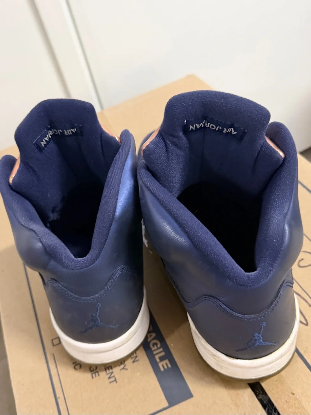Jordan Men's Navy Blue High-Top Sneakers with Copper Accent